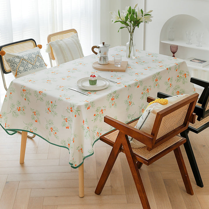 Rectangular washable cotton-polyester tablecloth with contrasted decorative edge and botanical print