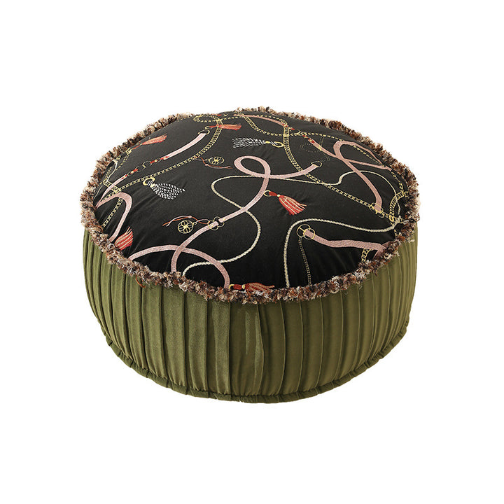 Round decorative floor cushion pouf with velvety printed top, pleated side wall, and fringe edge