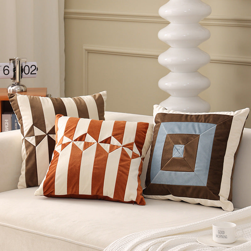Square decorative cushion with striped velvet inlay and geometric pleated look