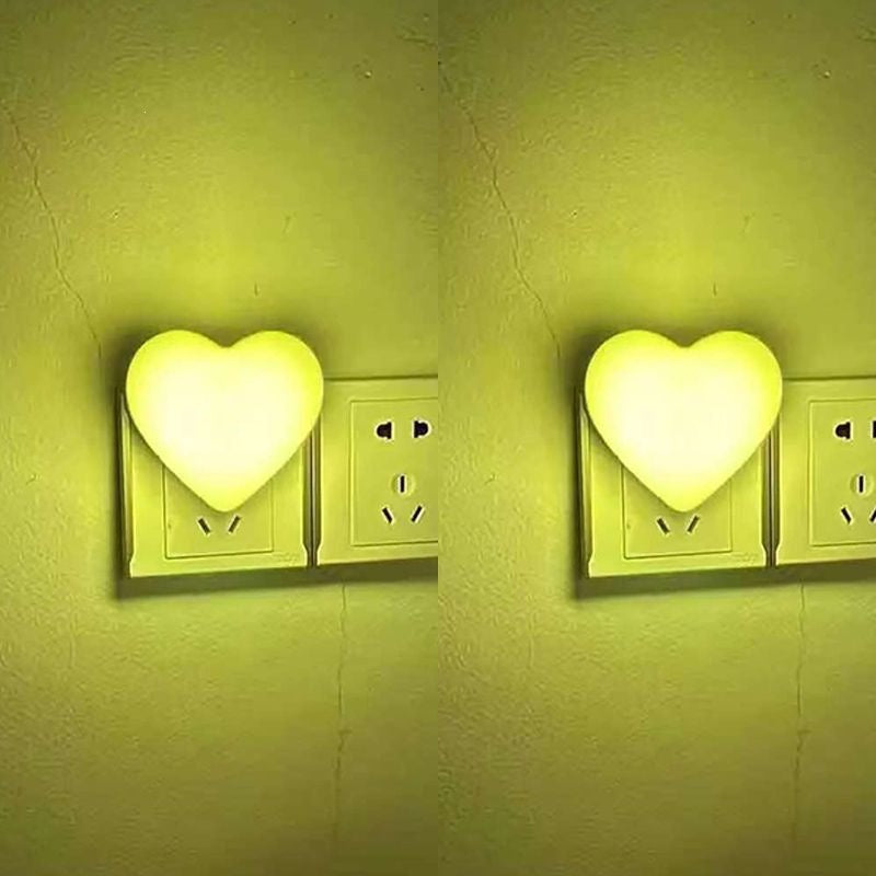 Heart-shaped plug-in ambient night light with soft LED lighting