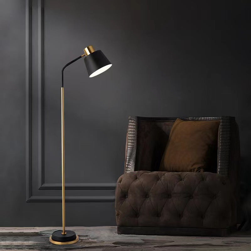 Slim Brass Torchiere Floor Lamp with Tilted Cone Shade and Adjustable Neck