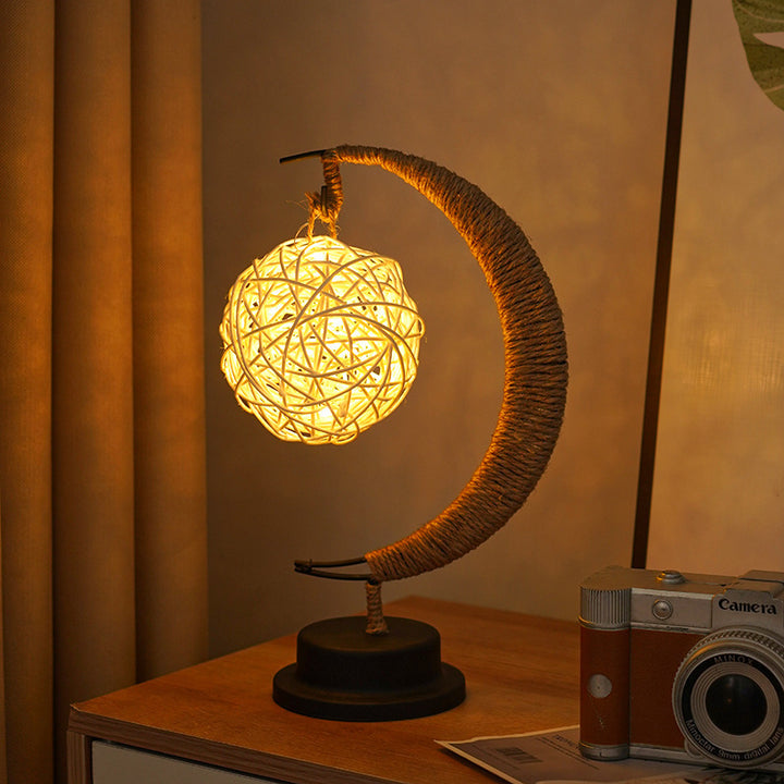 Decorative glass apple LED table lamp with moon-shaped rope-wrapped stand