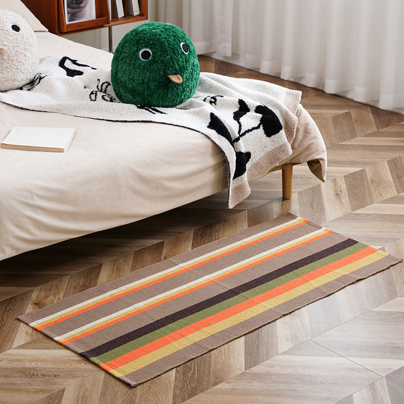 Flat-woven runner rug with check pattern and decorative border stripe
