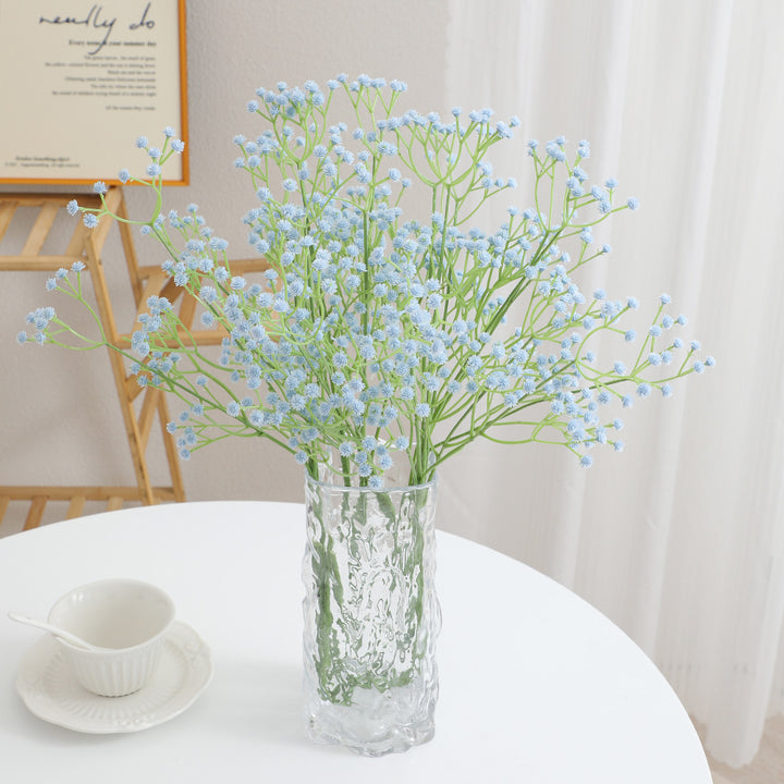 Decorative artificial flower branch with fine purple flowers