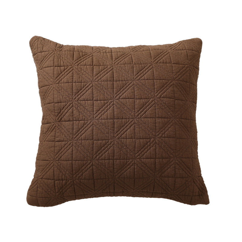 Square quilted decorative cushion made of cotton blend fabric with geometric cross quilted pattern