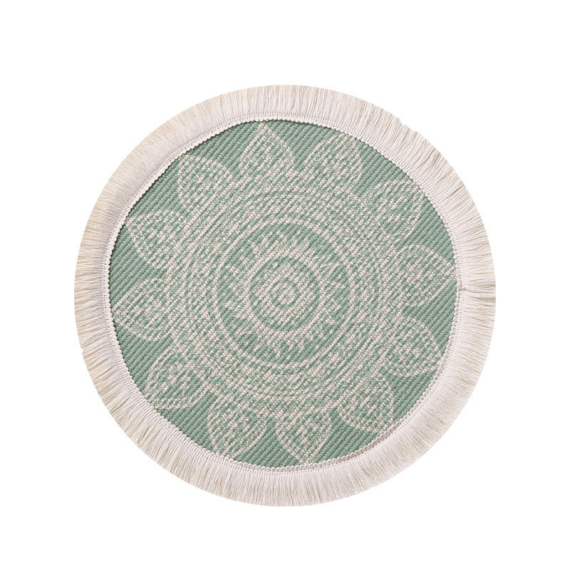 Round woven placemat with fringes and mandala jacquard structure