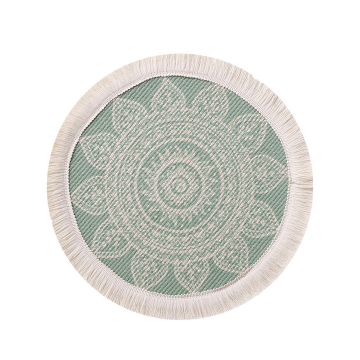 Round woven placemat with fringes and mandala jacquard structure