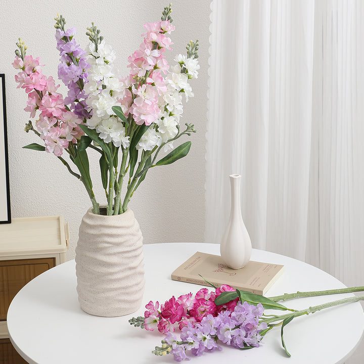 Artificial orchid bouquet with realistic flowers