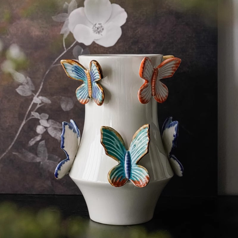 Decorative flower vase with butterflies