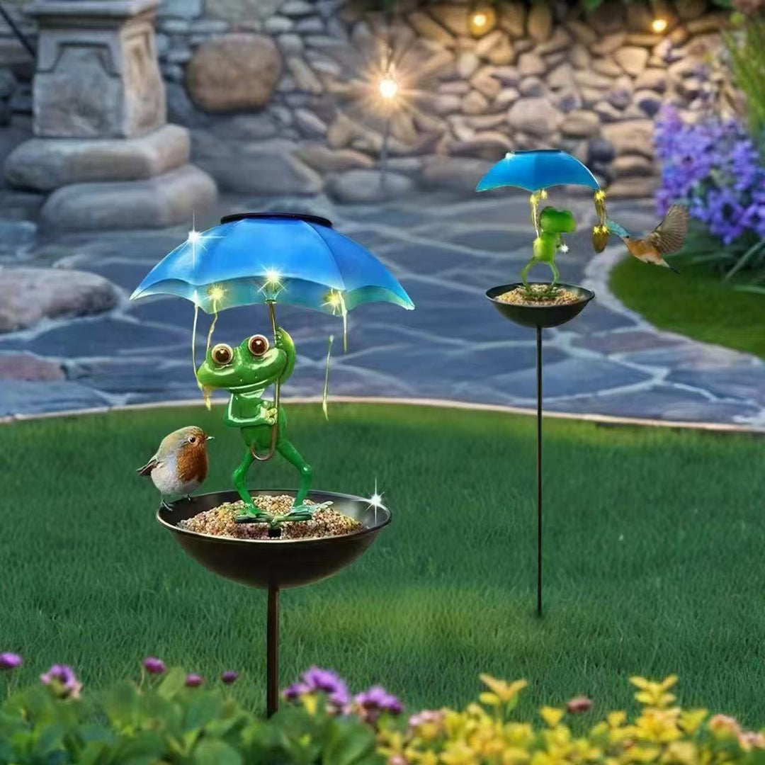 Decorative garden birdhouse stake with protective umbrella and playful frog decoration
