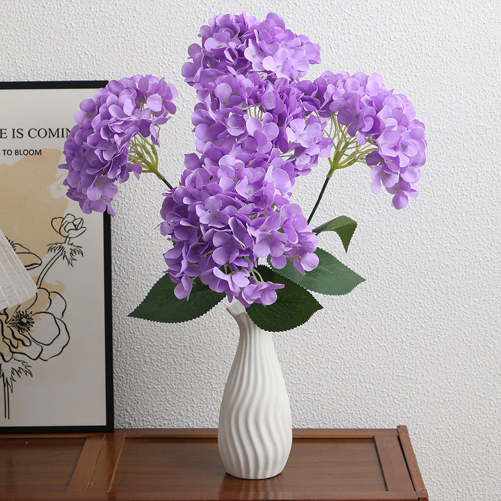 Decorative artificial flower arrangement