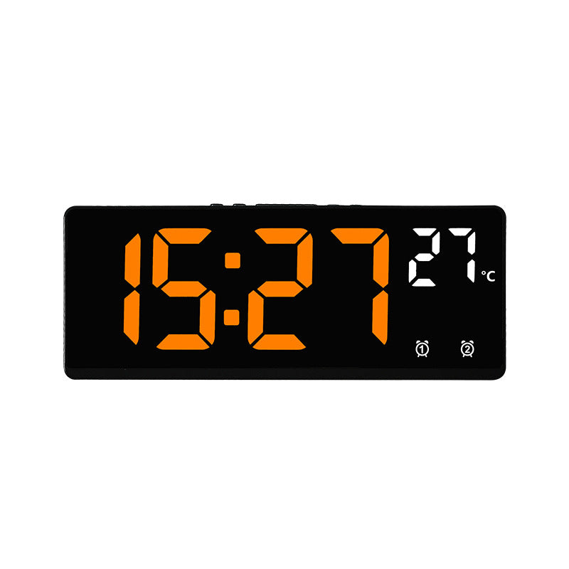 Digital alarm clock with mirror display and temperature function