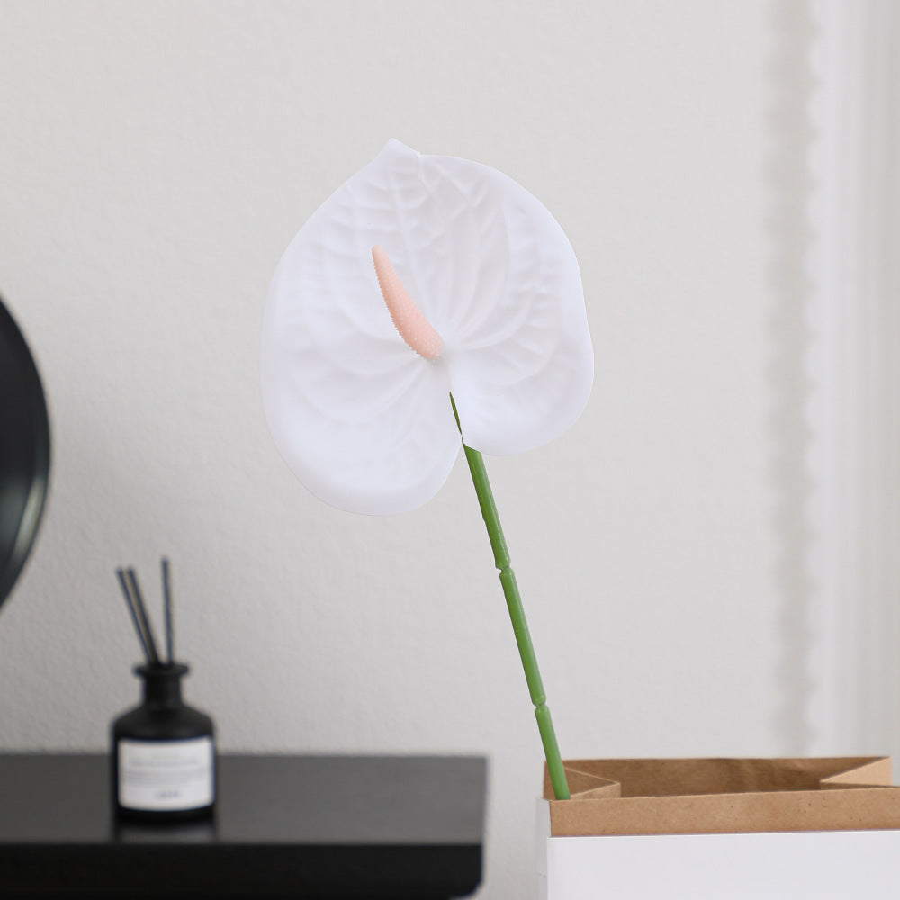 Elegant artificial orchid with delicate flowers