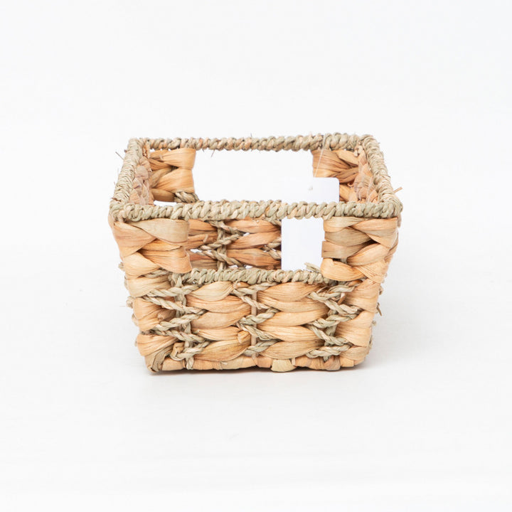 Rustic storage basket made of woven natural material