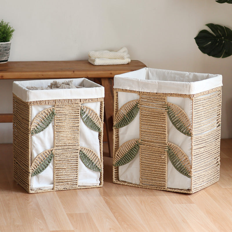 Elegant laundry basket made of natural wicker with fabric lining