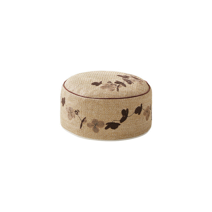 Round floor pouf seating with embroidered floral border