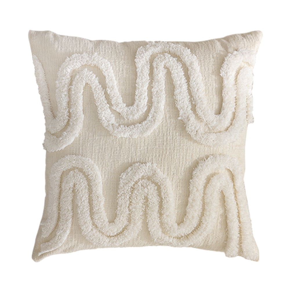Geometric tufted sofa cushion with textured loop appliqué and removable cover