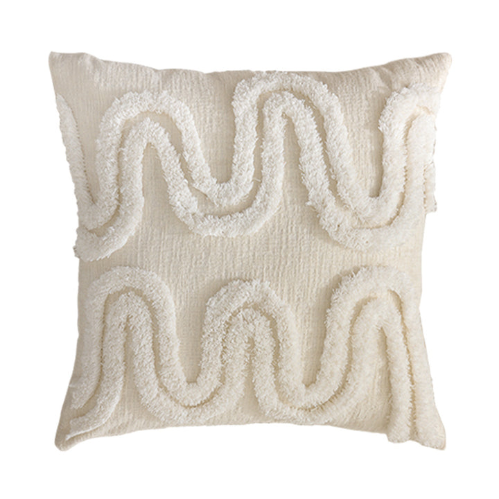 Geometric tufted sofa cushion with textured loop appliqué and removable cover