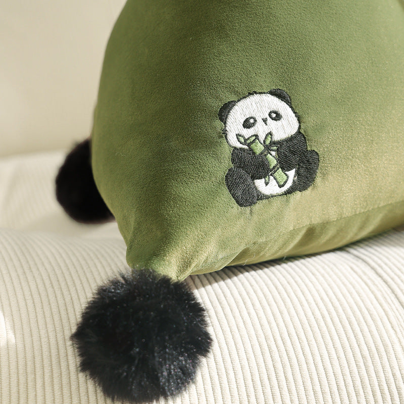 Triangular decorative pillow with zebra embroidery, pompom applications, and soft velvet cover