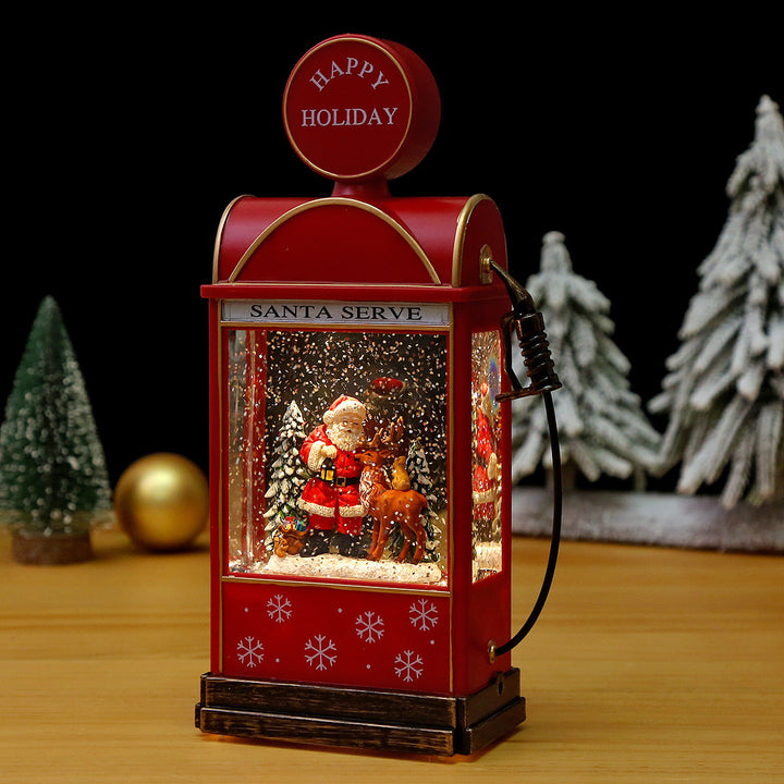 Illuminated Christmas lantern with snow and Christmas motif