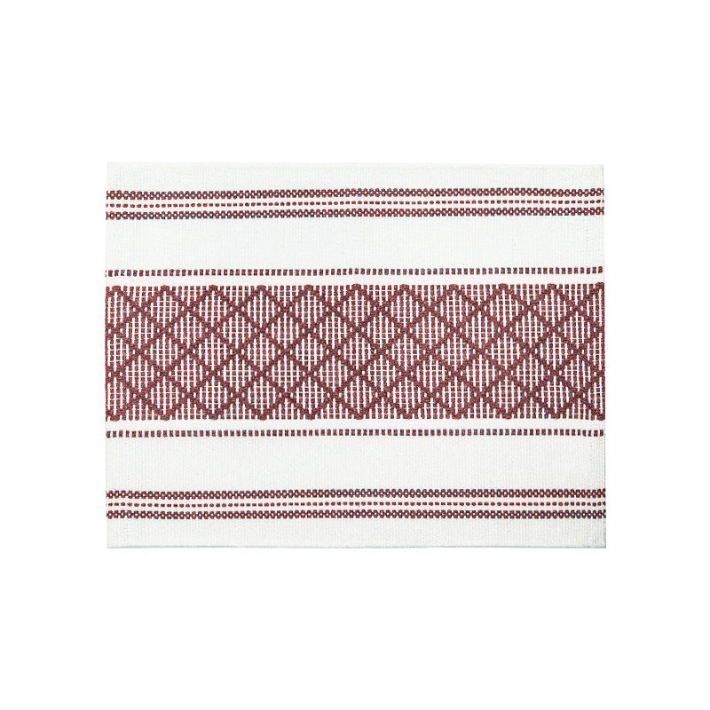 Flat woven placemat with woven diamond jacquard pattern