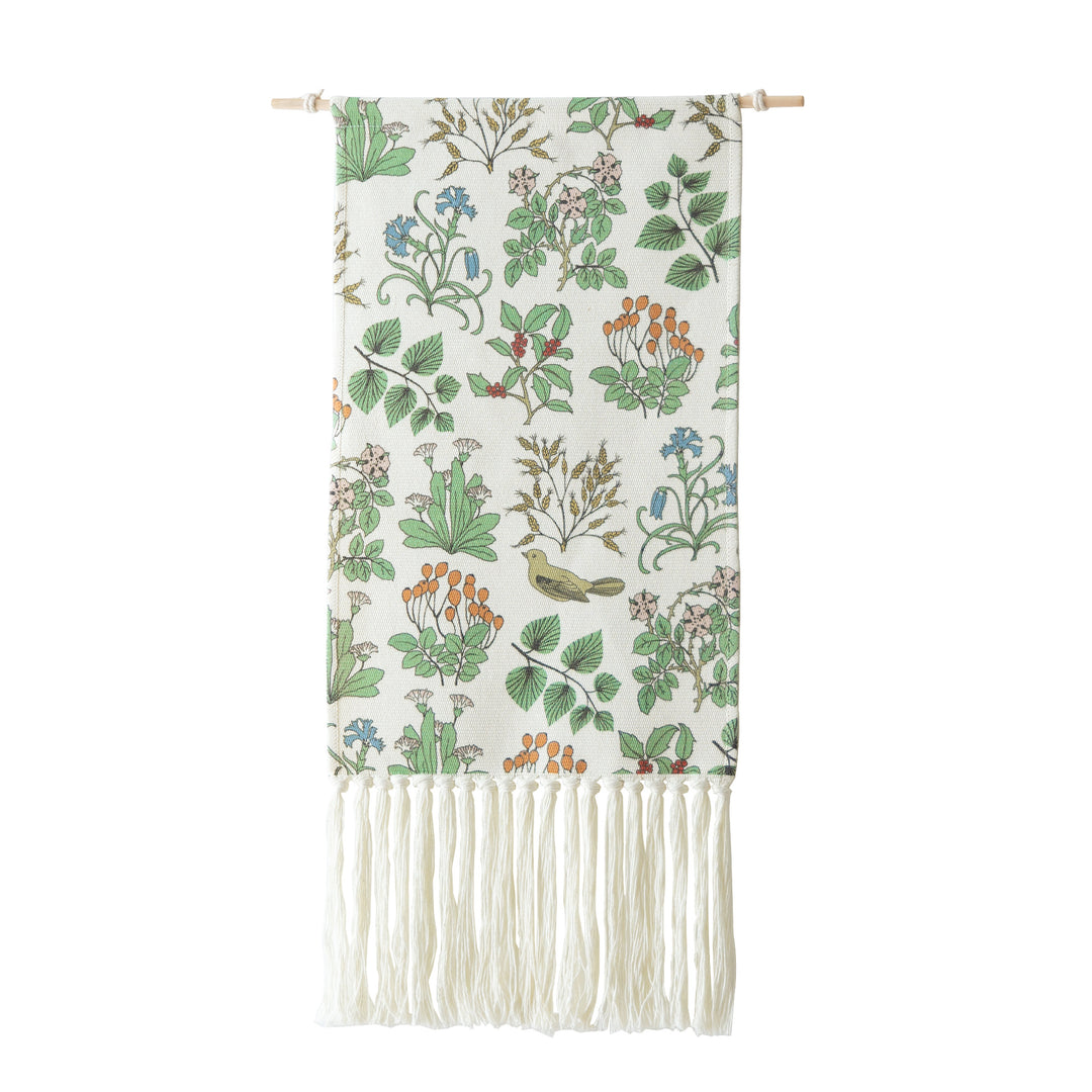 Woven wall hanging with floral jacquard structure and long fringes