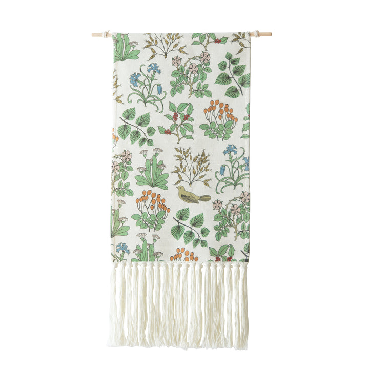Woven wall hanging with floral jacquard structure and long fringes