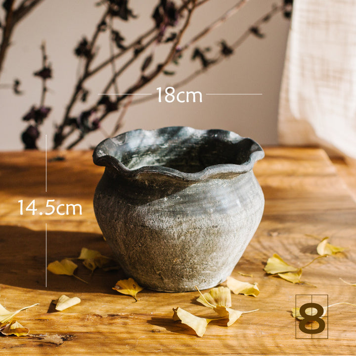 Rustic ceramic pot with handmade design