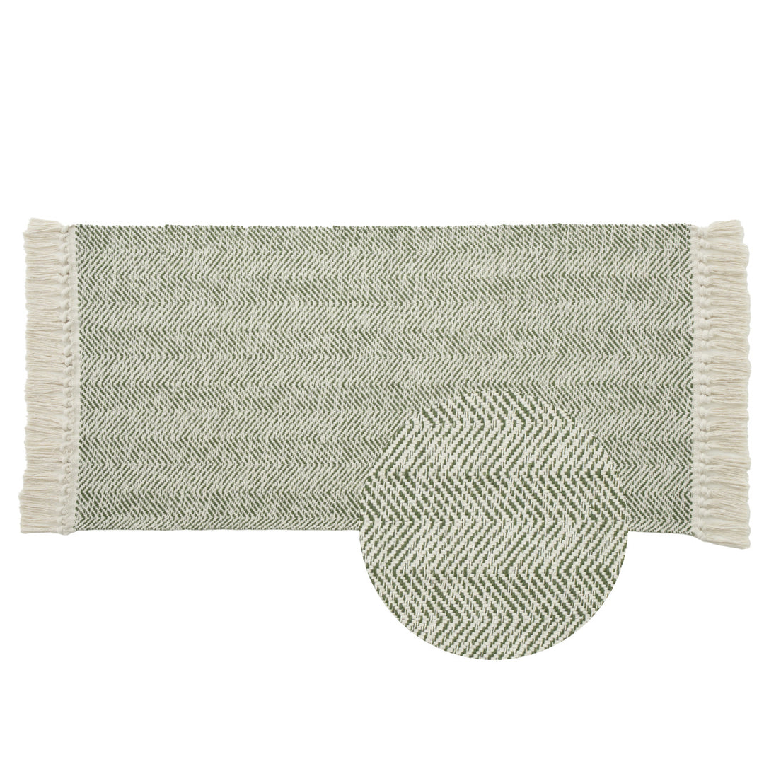 Handwoven runner rug with chevron weave and long fringes