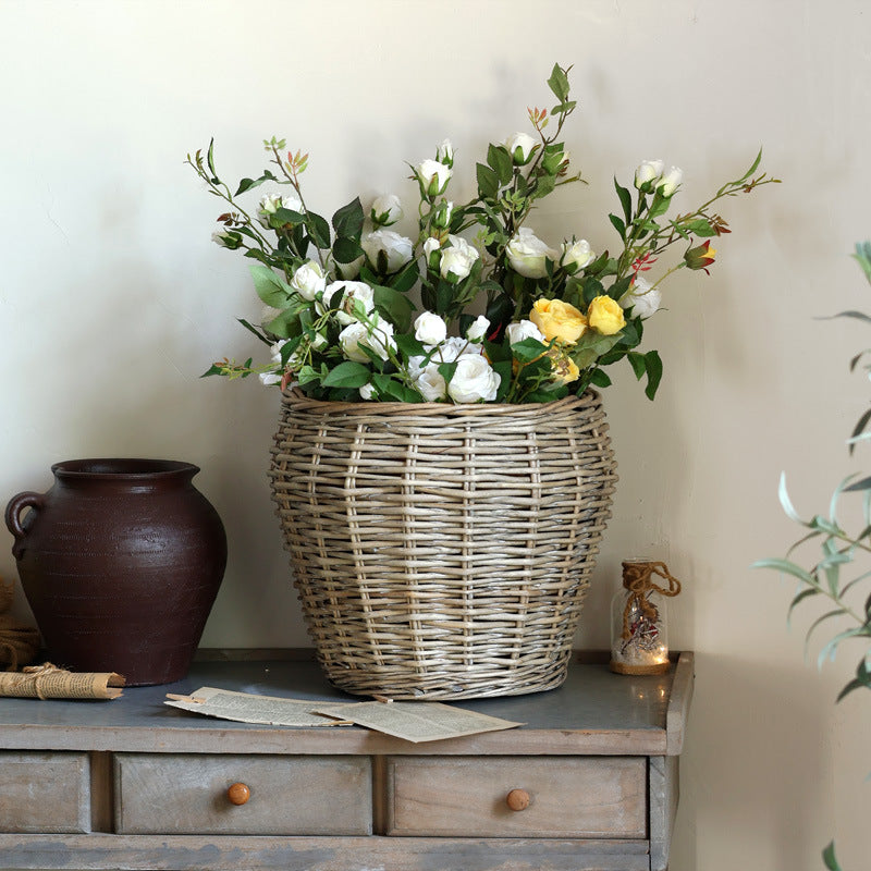 Stylish laundry basket made of braided natural material