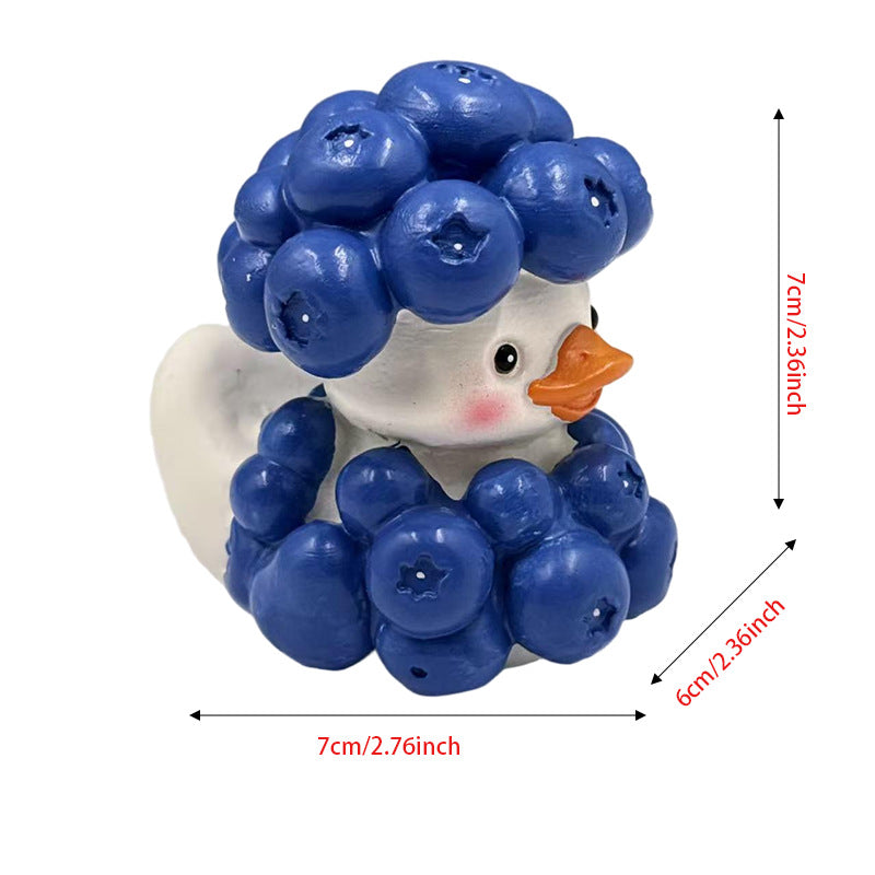 Funny rubber duck with berry pot cut
