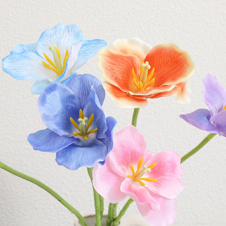 Artificial orchid flower branch with intricately detailed flowers