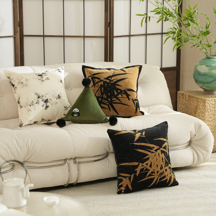 Decorative velvet cushion with embroidered bamboo motif and piping