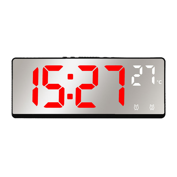 Digital alarm clock with temperature sensor and mirror function