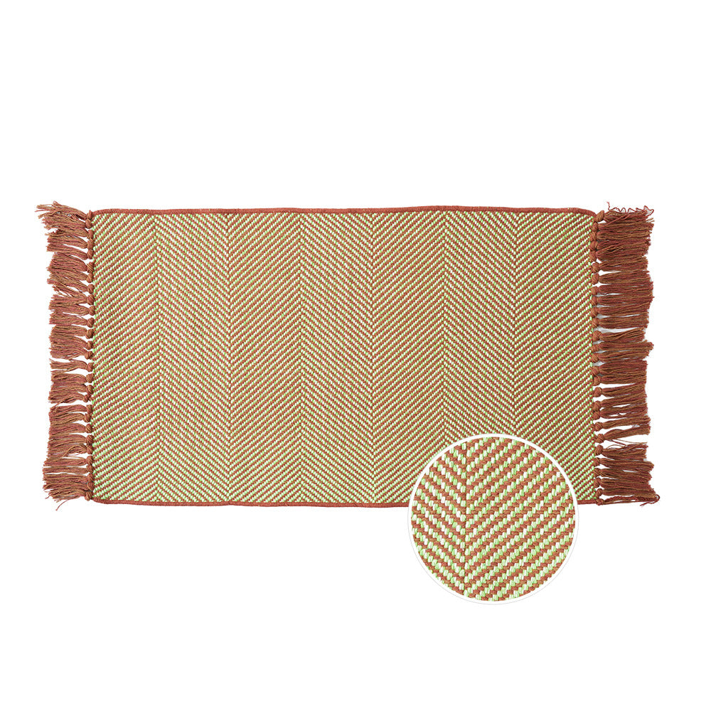 Woven table runner with dense herringbone jacquard and fringes