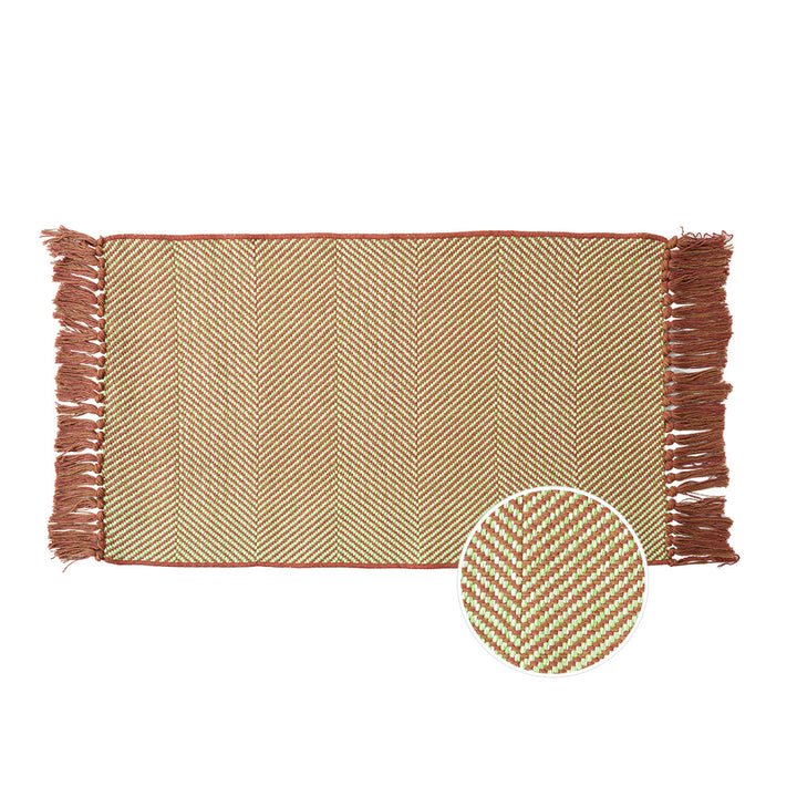 Woven table runner with dense herringbone jacquard and fringes
