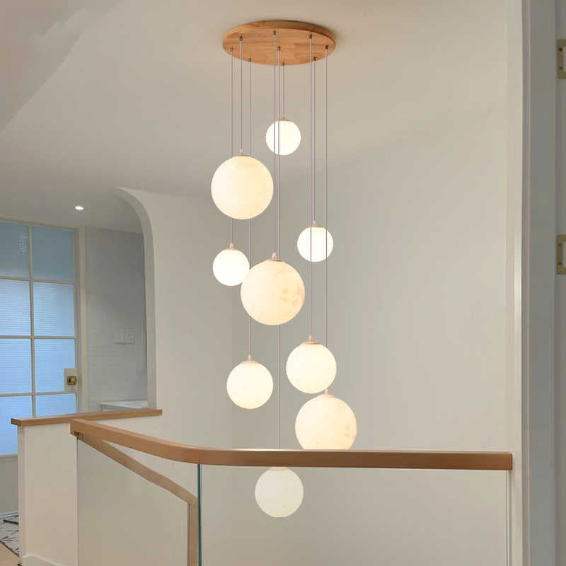 Cascading glass globe pendant lamp with wooden ceiling
