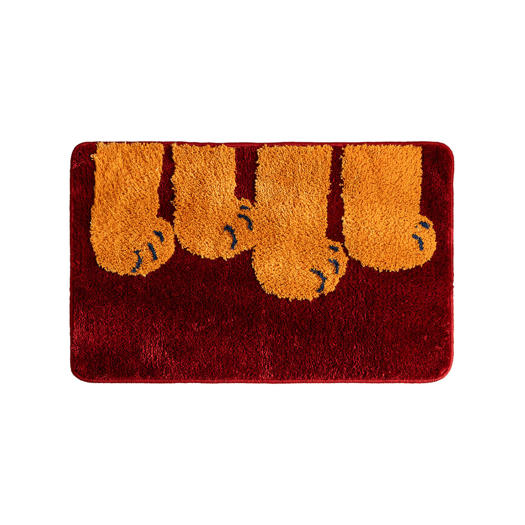 Fluffy bathroom doormat with paw relief