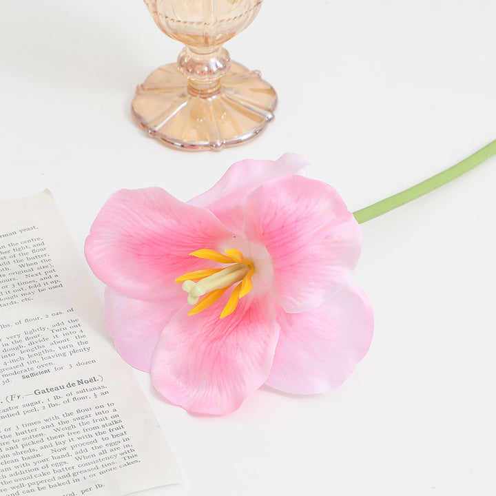 Artificial orchid flower branch with intricately detailed flowers