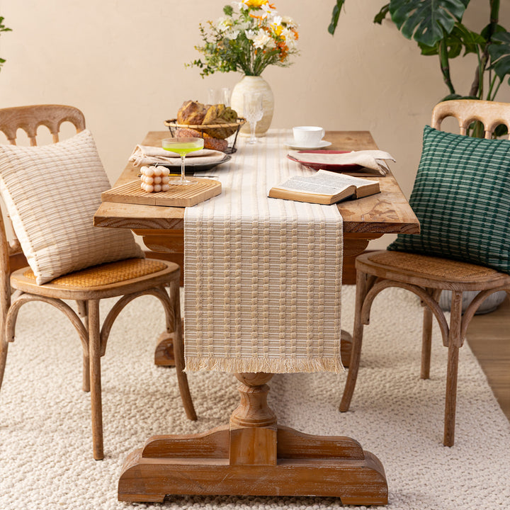 Handwoven plaid made of cotton with structured stripes and fringes