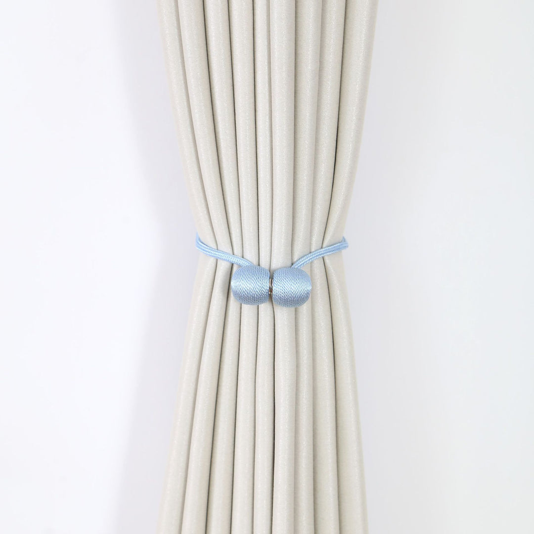 Decorative curtain tieback