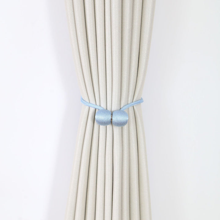 Decorative curtain tieback