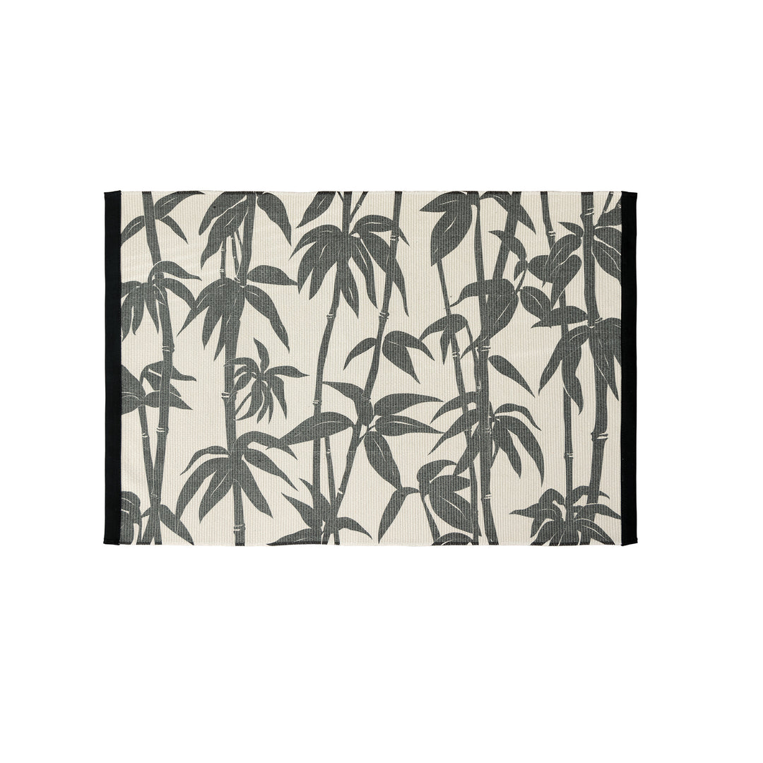Woven table runner with floral vinyl print look and reinforced overlock stitching