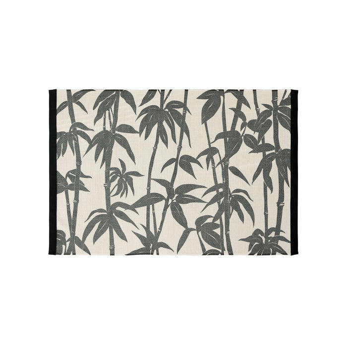 Woven table runner with floral vinyl print look and reinforced overlock stitching