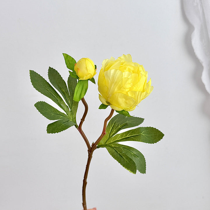 Artificial peony bouquet with delicate flowers and leaves