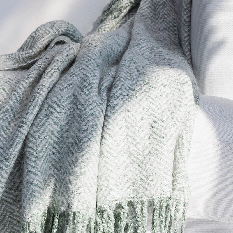 Coarsely woven throw blanket with herringbone jacquard and long fringes