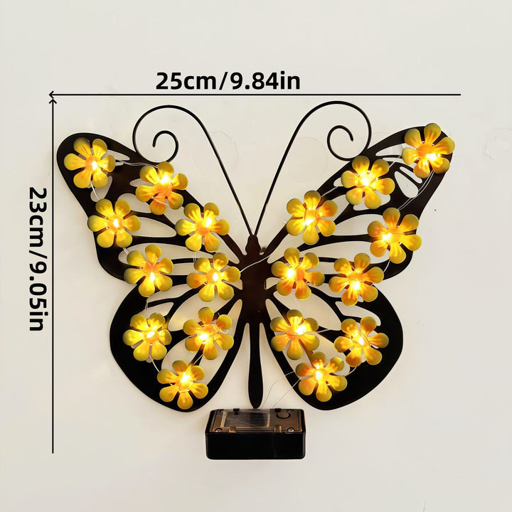 Decorative metal butterfly wall lamp with solar-powered flower LED string