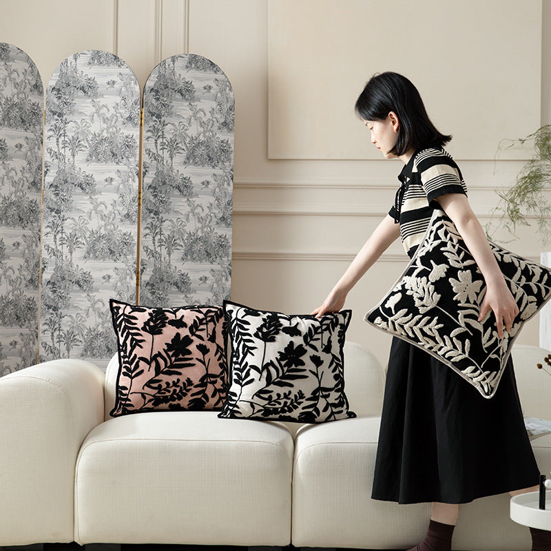 Decorative cushion cover with floral flock application