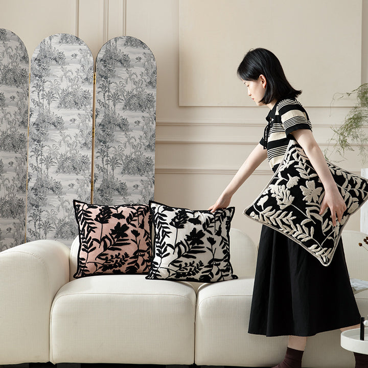 Decorative cushion cover with floral flock application