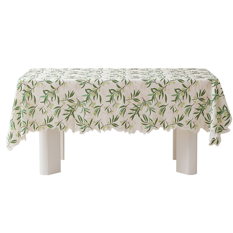 Round wipeable tablecloth with floral cut-out hem